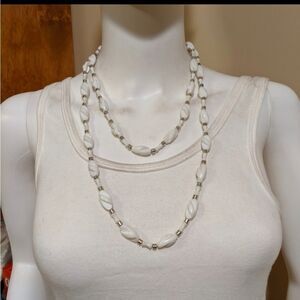 Long white shapes beaded necklace